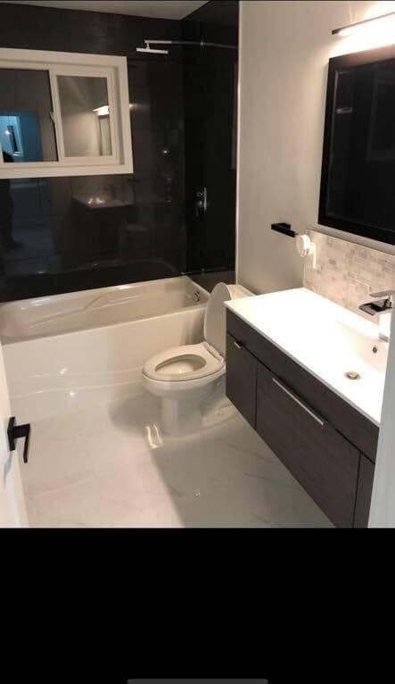 Bathroom after — modern black and white bathroom